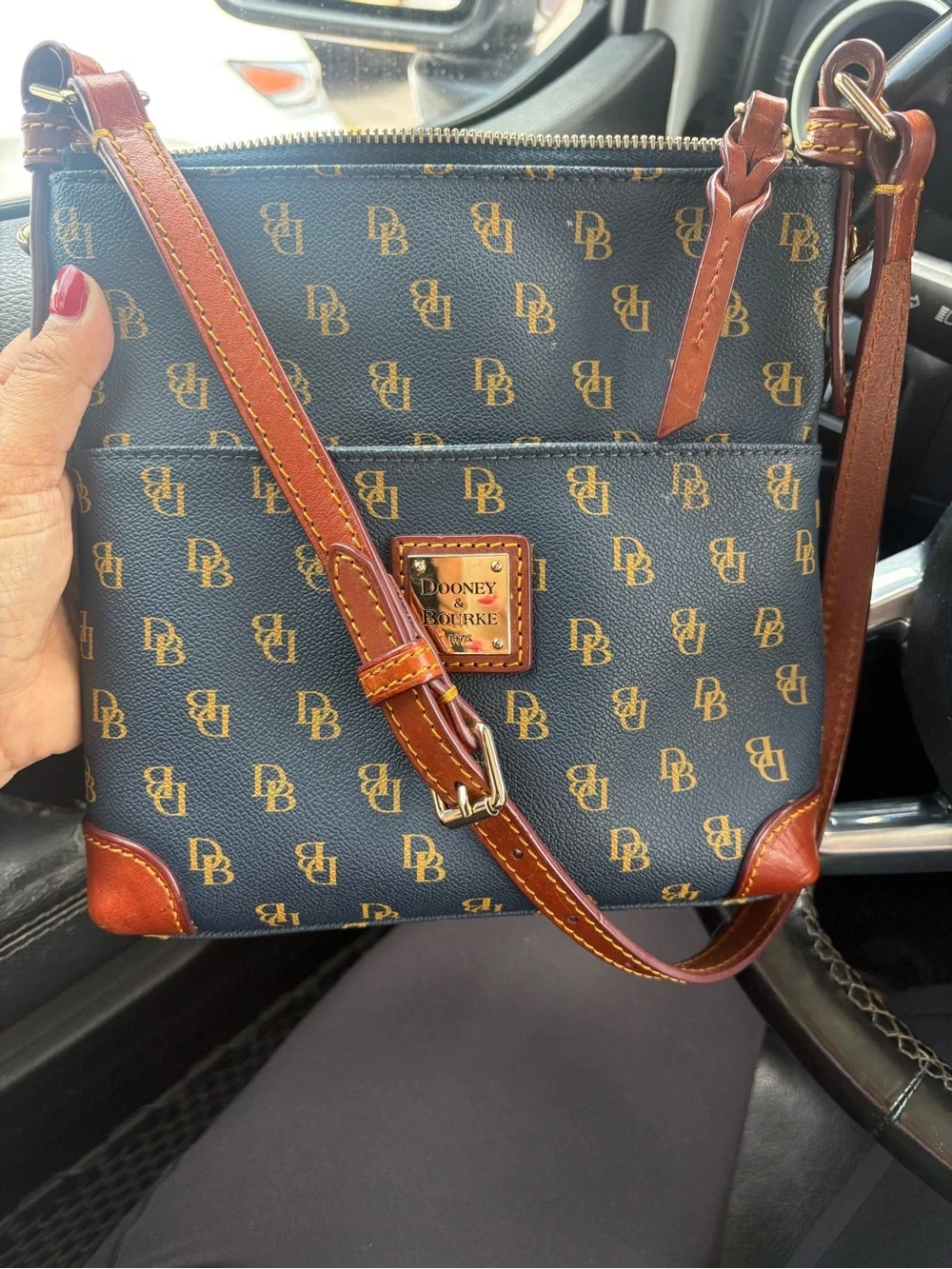 Dooney & Bourke navy with Brown Trim Monogram Crossbody